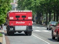 Dunbar armored truck parked on a street